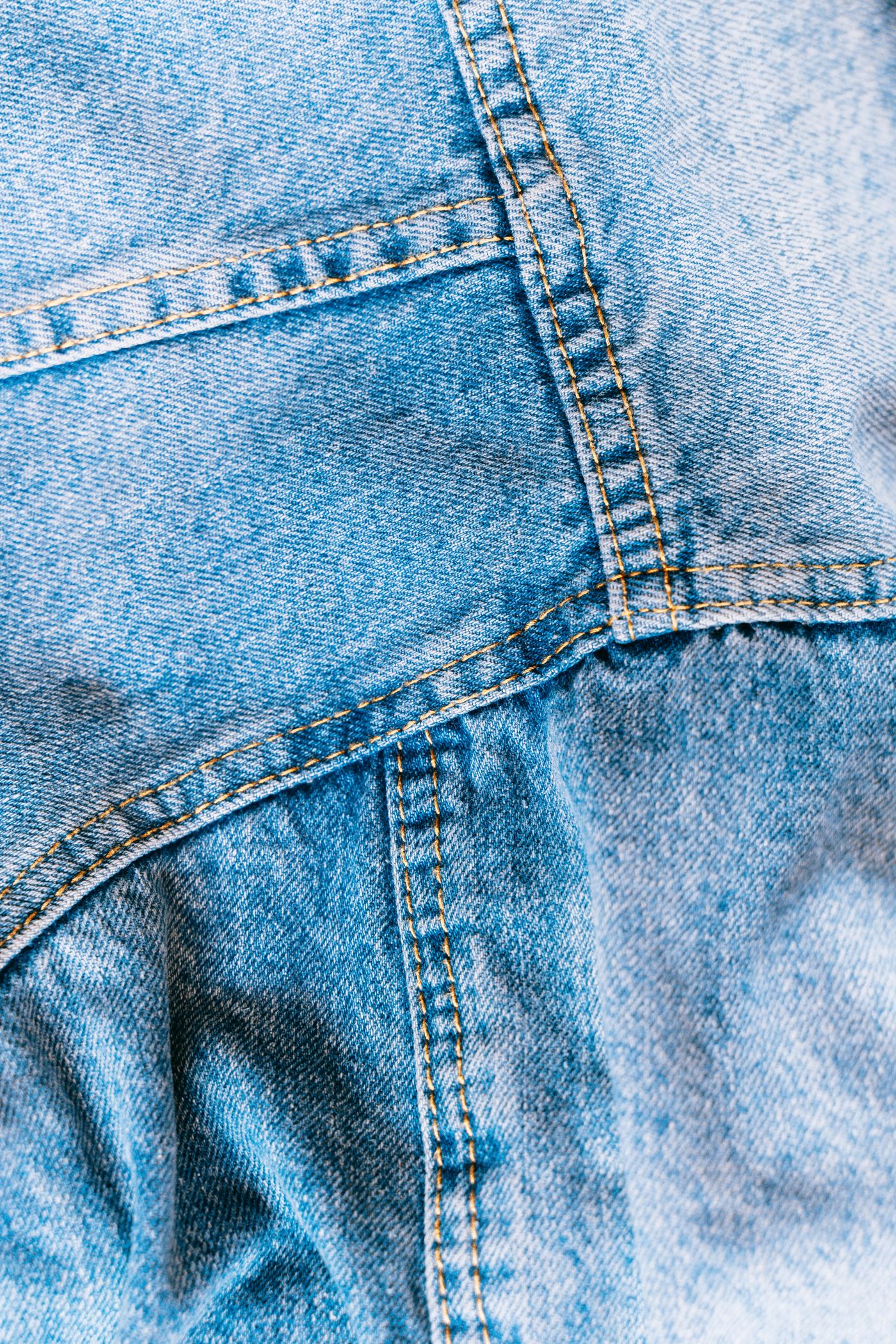 Close-up of stitched seams on denim